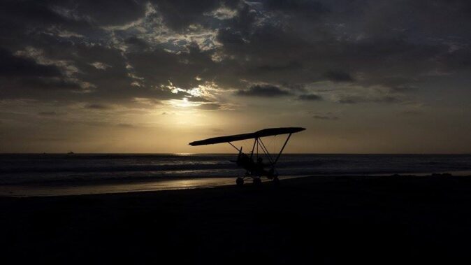 flying a microlight in Rosarito, Mexico flying a microlight in Rosarito, Mexico