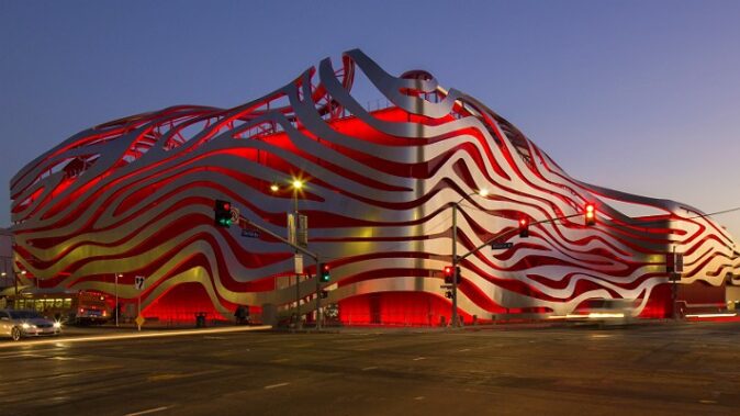 What to do in 2 days in LA: Miracle Mile A futuristic building with a lot of metal and red lighting