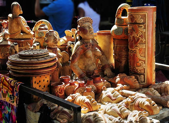 masks and other handicrafts for sale at a market in Chichicastenango