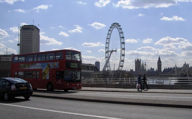 A double-decker bus and the London Eye