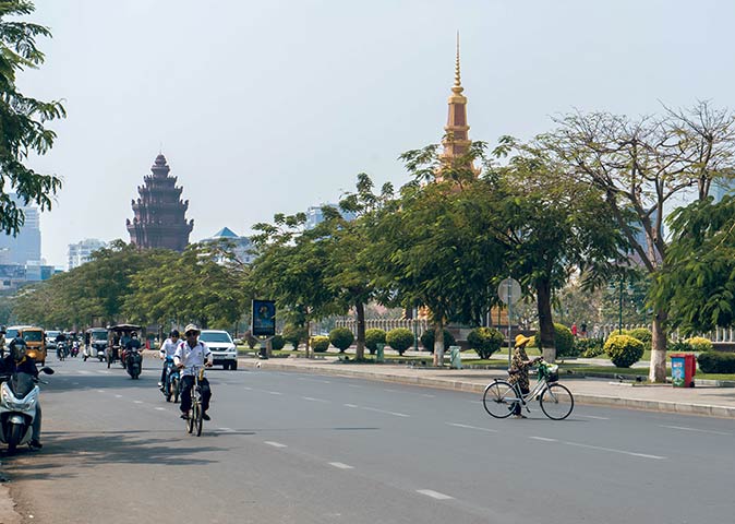 traffic on a wide road in Phnom Penh