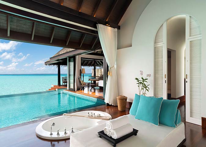 looking out over the bathtub and pool to the sea from one of the villas in the resort