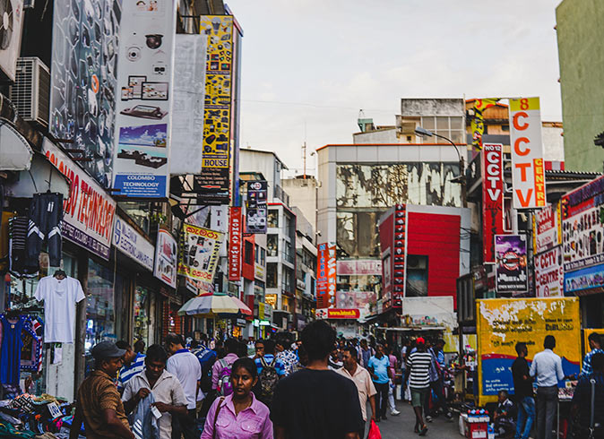Living in Sri Lanka a crowded street in Colombo with shops on both sides