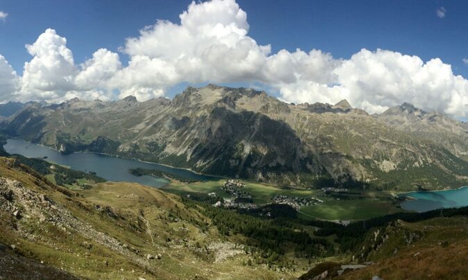 Best views of Switzerland: Sils Maria Two large lakes surrounded by green and gray mountains