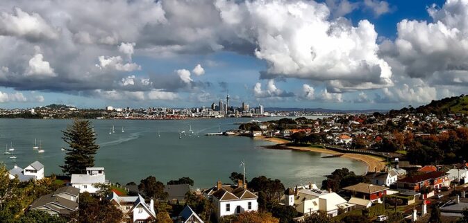 Day 1 of a 7 day New Zealand North Island itinerary Aerial view of a bay with sailboats surrounded by many houses