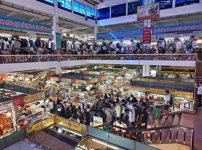 a crowded 2 storey indoor market