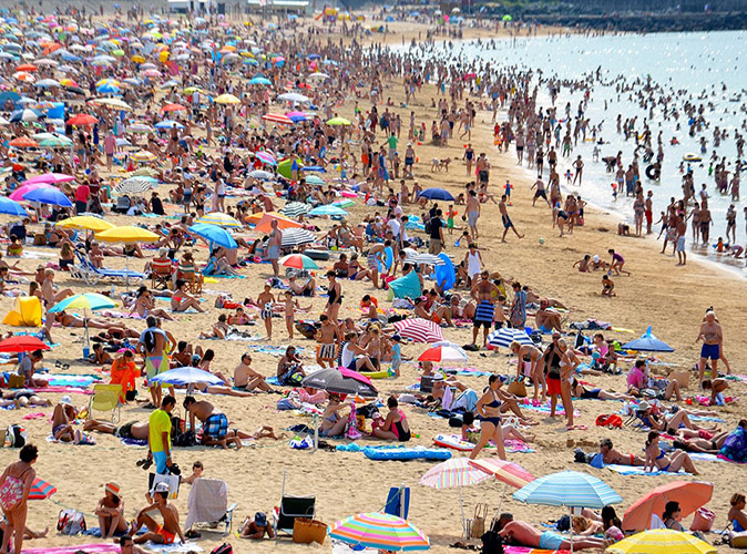 A very crowded, sunny beach