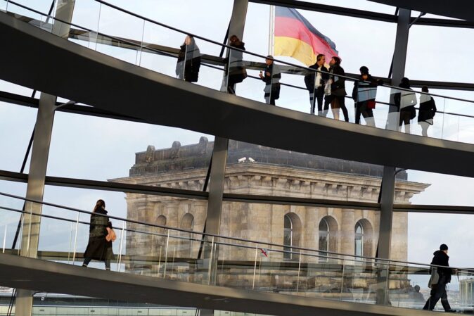 What to know before moving to Germany people in the Reichstag in Berlin