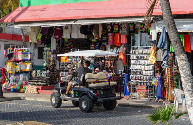 driving around Isla Mujeres in a golf cart