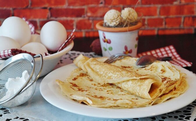 a traditional Dutch food: pancakes a plate of traditional Dutch pancakes