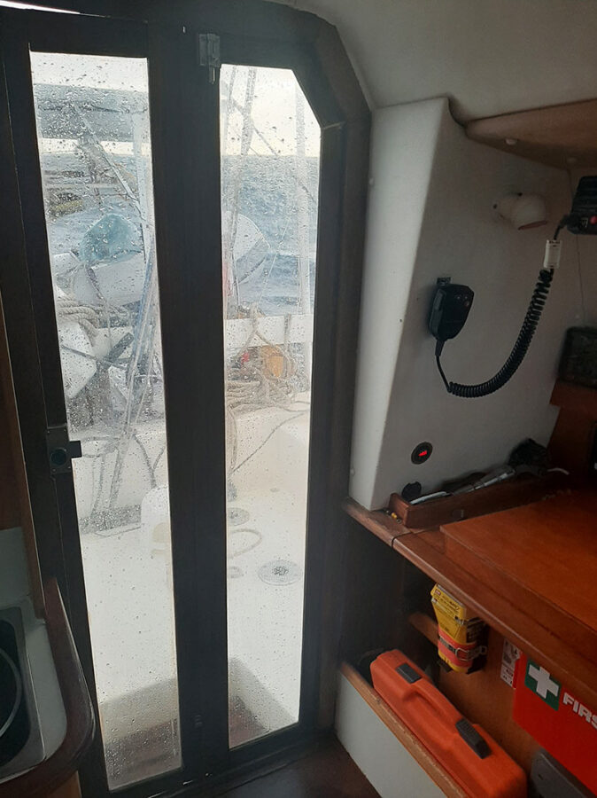 Hiding from the rain during a squall rain on the window during a squall