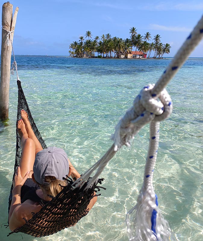 bucket list trip of a lifetime sitting in a hammock in Panama