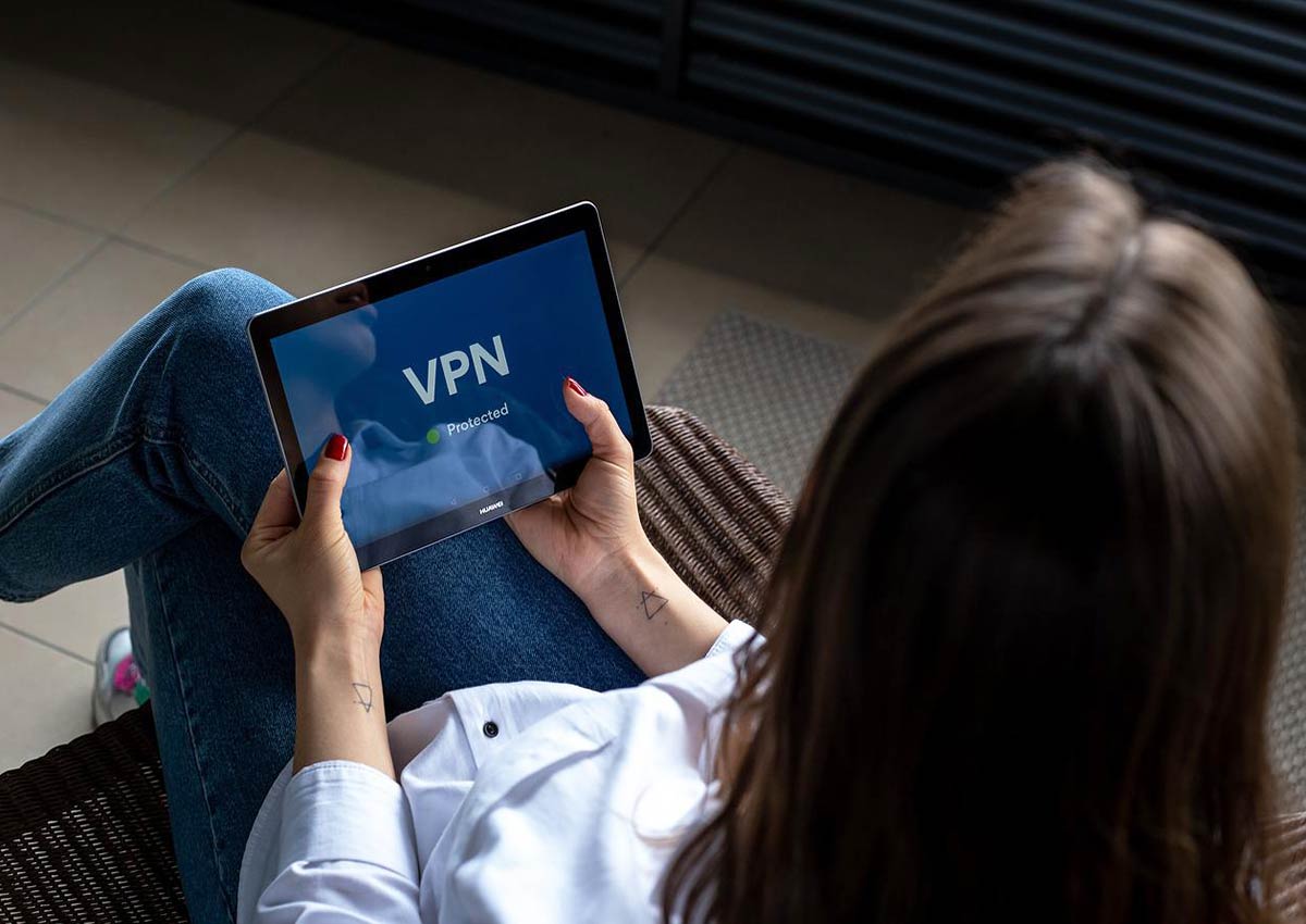 woman using a VPN while traveling