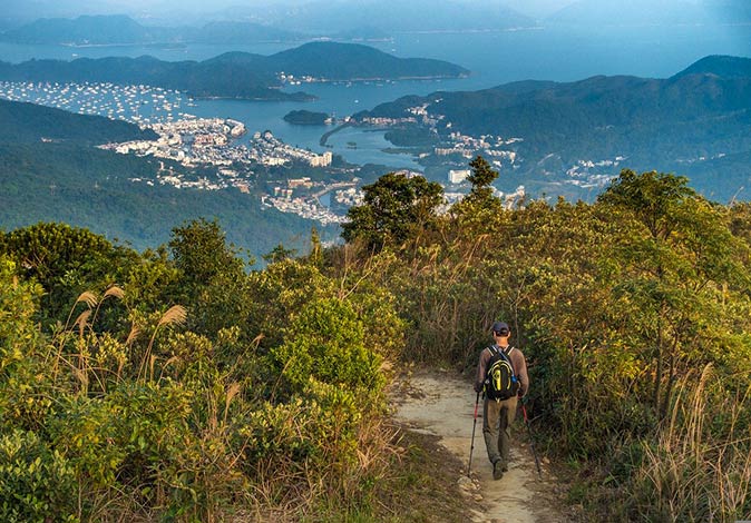 a man hiking after moving to Hong Kong