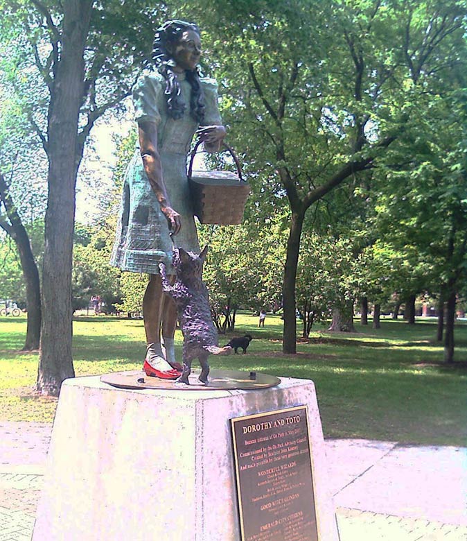 a statue of Dorothy in Oz Park