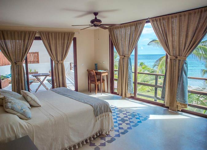 a hotel room with sea view in Tulum