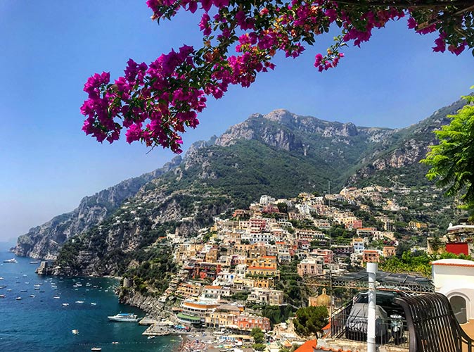 a view of Positano, a popular coastal village in Italy to visit