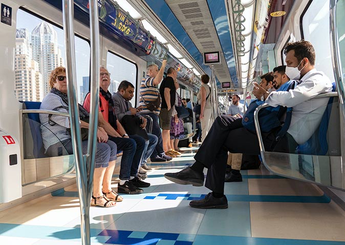 people sitting inside a metro