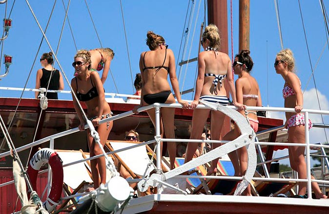 Several girls in bikini on a boat in Croatia