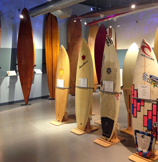 A visit to the surf museum is an inexpensive thing to do in San Diego a room filled with different sized surf boards