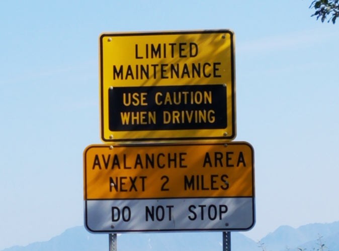 A road sign in Alaska indicating an avalanche area