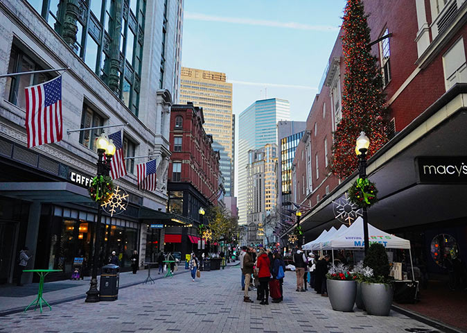 Christmas time in Boston Christmas decorations in a typical American shopping street with several people