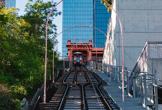 Experience LA like a local A railway track surrounded by highrise buildings