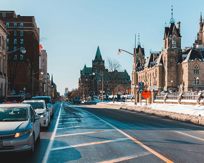 What it's really like to live in Ottawa A street with cars parked, snow on the sidewalk and historic buildings