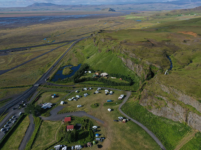 A campground in Iceland Aerial view of a campground in Iceland with tents, RVs and caravans