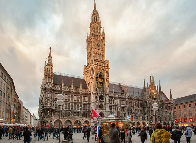 What it's like to move to Munich A historic church on a square with several people