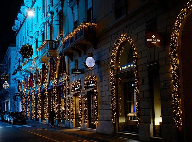 Christmas decoration around shop windows at night