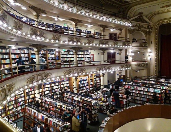 Buenos Aires for digital nomads A modern looking, round 3 storey library filled with books